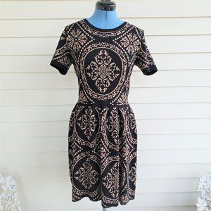 Romeo and Juliet Couture form fitting short sleeve sweater dress